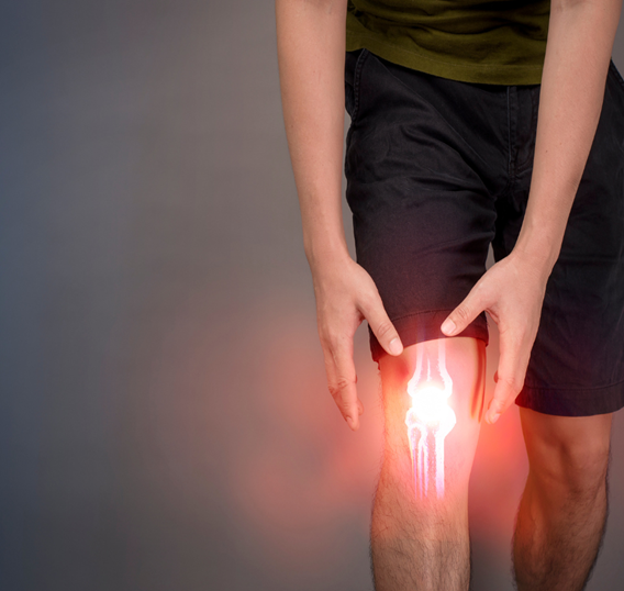 Man suffering from knee pain